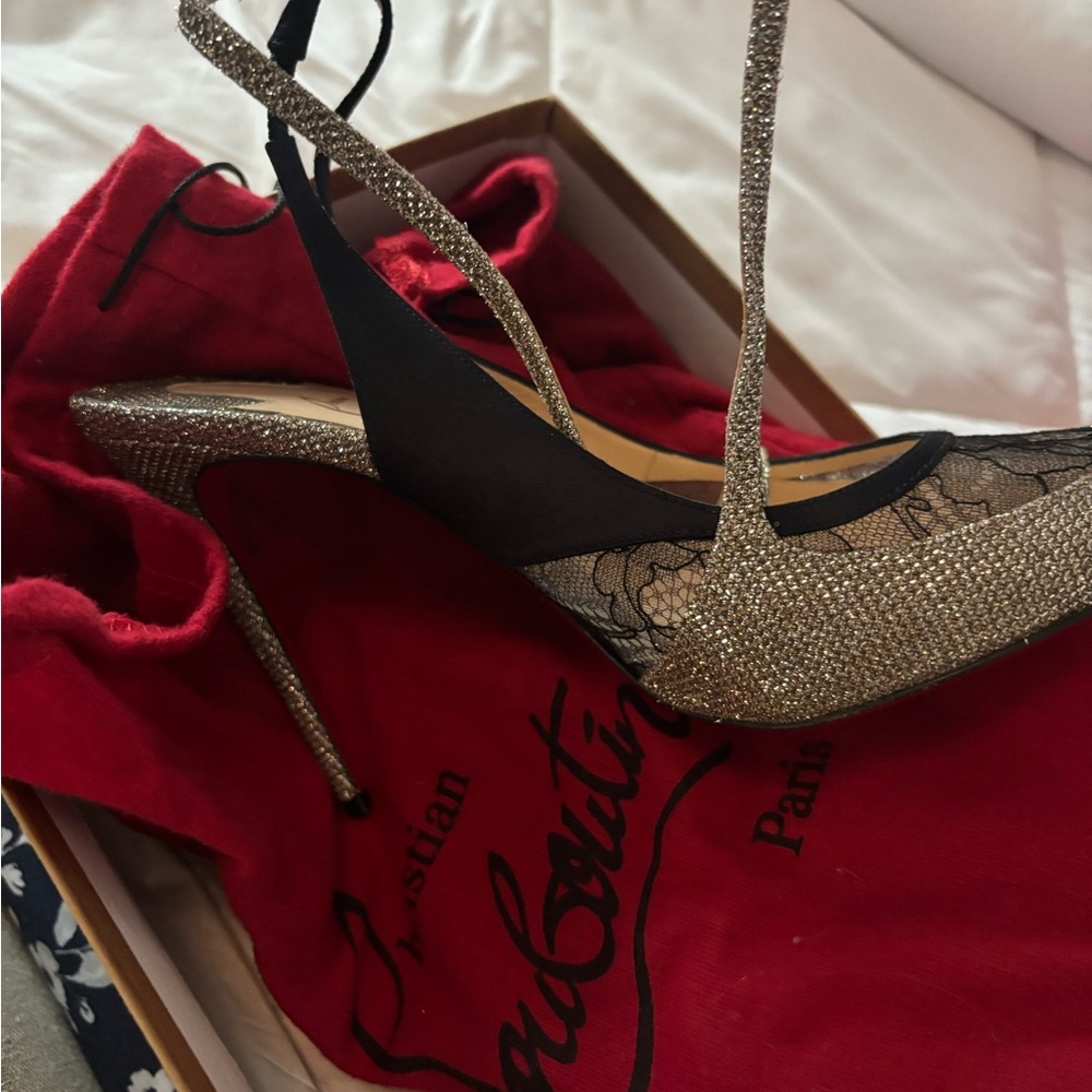 Christian Louboutin Glittering Silver Heels with Signature Red Soles